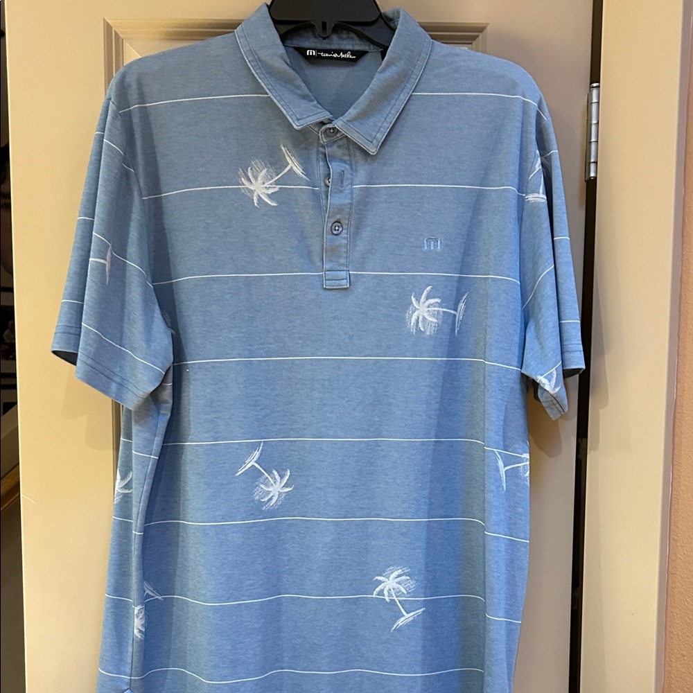 Travis Mathew Blue Polo with White Palm Trees